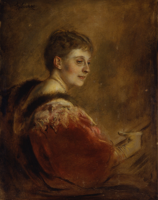 A woman in profile looks over her shoulder, to the right. She is wearing a red gown trimmed with white lace and fur. Her hair is styled in a simple updo. She holds a book.