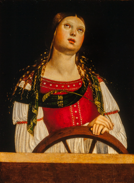 A woman in a red and white dress is pictured from the waist up, standing against a dark background. She looks upwards and rests her hands on a wheel in front of her. In her right hand, she holds a golden feather.